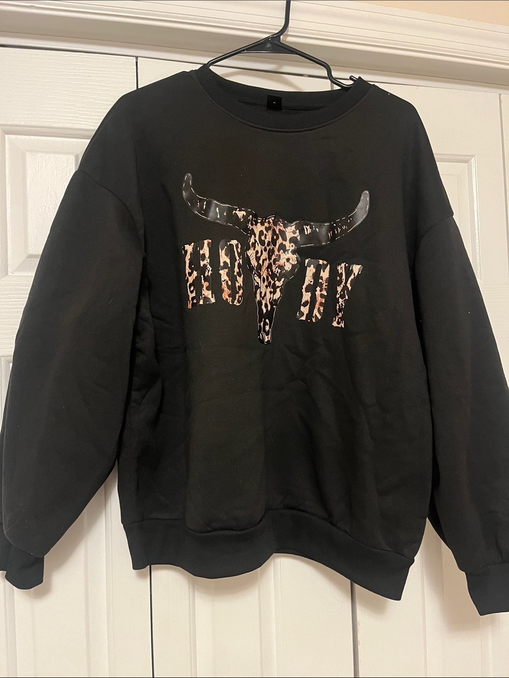 Black Sweatshirt with Leopard Bull Skull Graphic